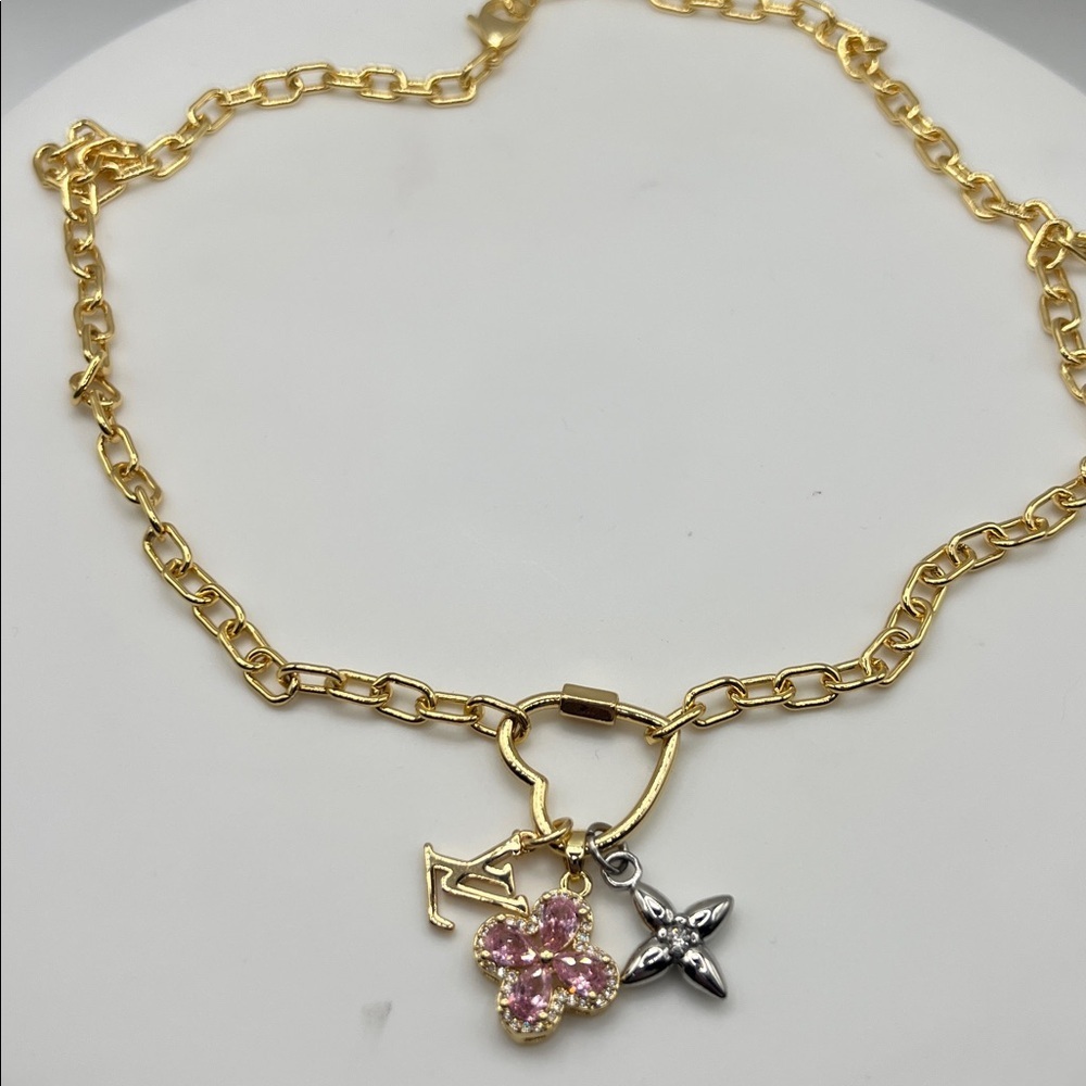 1458. Multi-Charm Necklace with 18k Gold Plated Chain. 20”